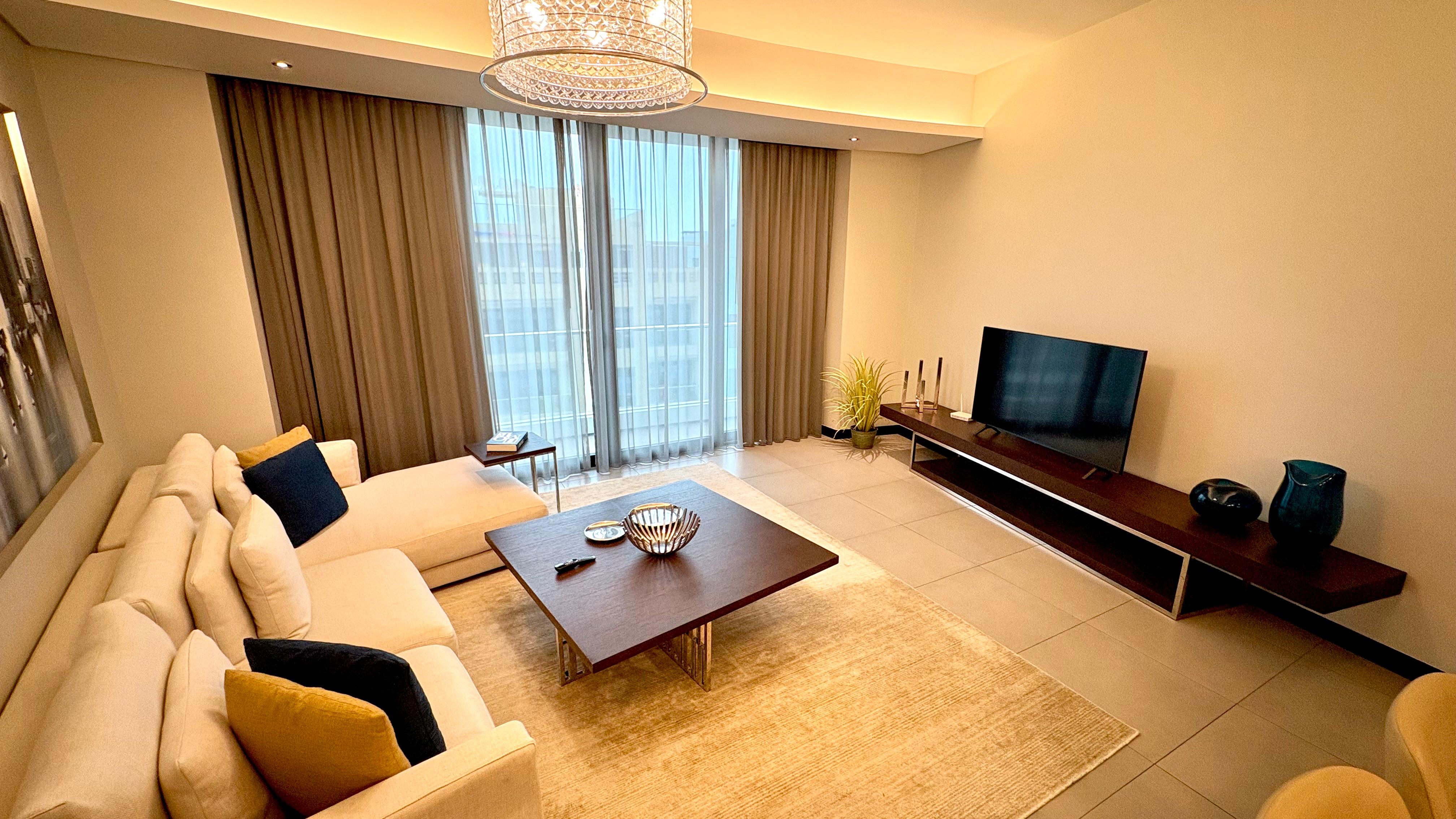 Modern 2BR Apartment | Pool, Gym & Covered Parking