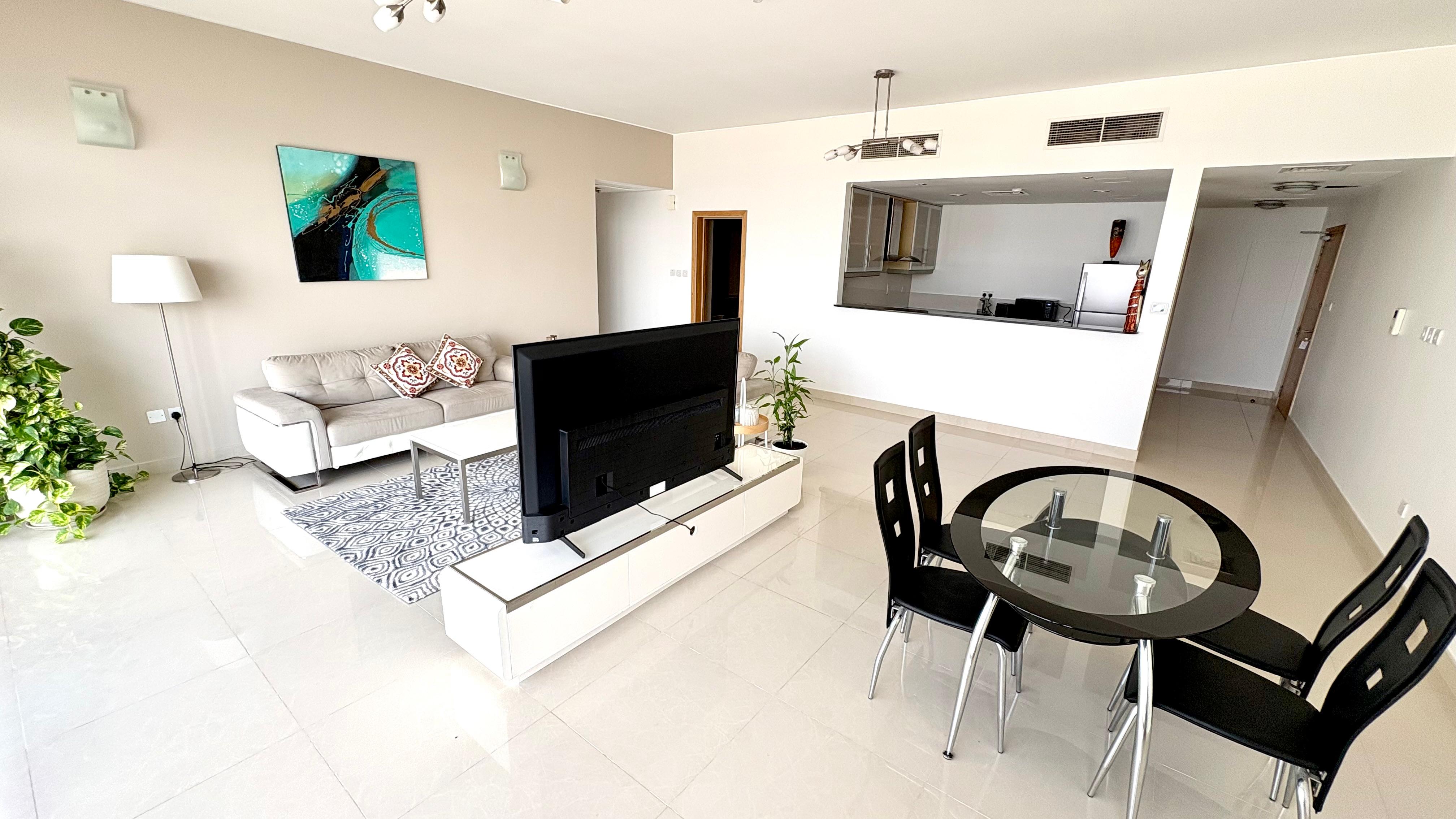Modern 2BR Apartment | Pool, Gym & Covered Parking