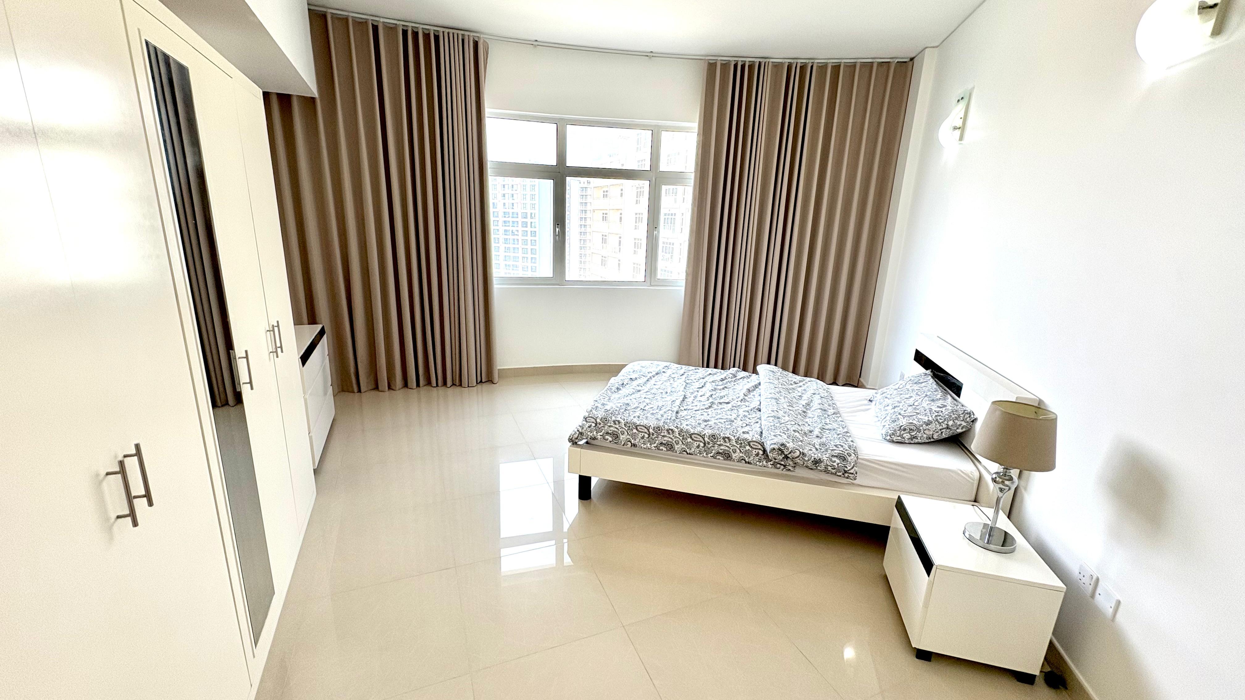 Modern 2BR Apartment | Pool, Gym & Covered Parking