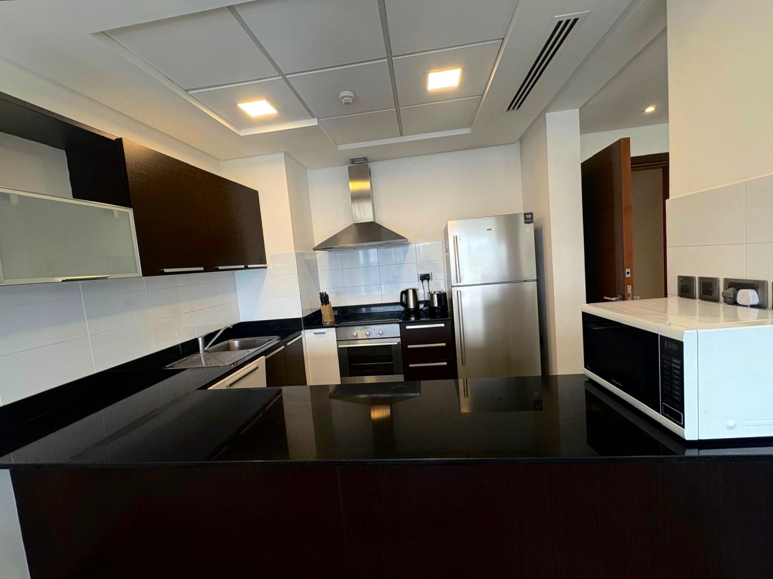 Modern 2BR Apartment | Balcony & Maids Room | Bright Living